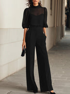 Valentina • Ensemble de trois pièces noir, composé d'un top camisole transparent et de pantalons à jambe large
